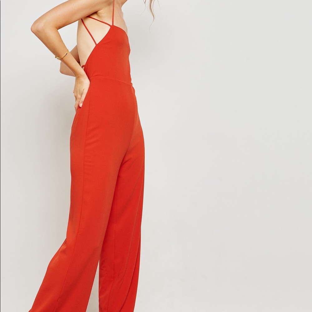 Red strappy backless jumpsuit